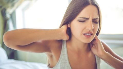 lady suffering from neck pain